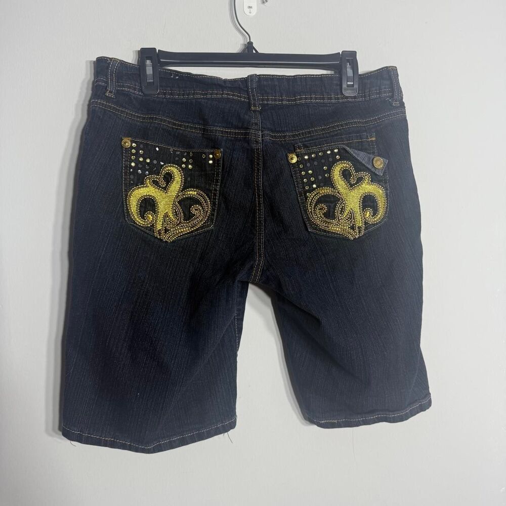 Southpole navy blue denim capri shorts with yellow accents and rhinestones. Size
